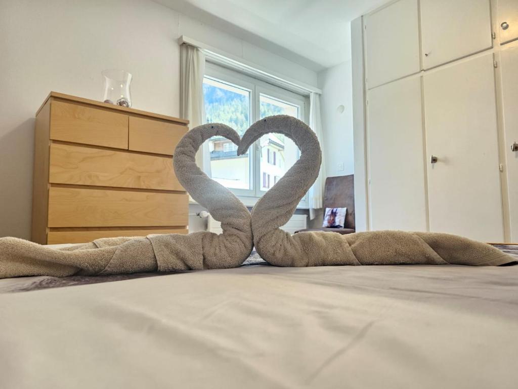 Postel nebo postele na pokoji v ubytování Leukerfun