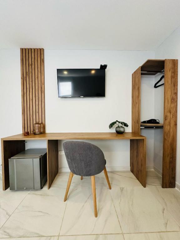 TV a/nebo společenská místnost v ubytování Hotel OR Suite
