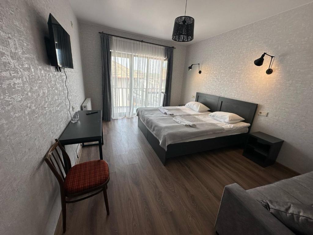 Postel nebo postele na pokoji v ubytování Hotel Terrace Rabath