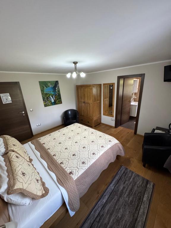 Postel nebo postele na pokoji v ubytování B&B Millenium House