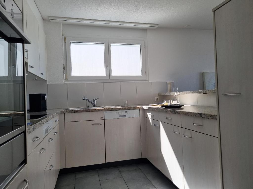 Kuchyň nebo kuchyňský kout v ubytování Senseblick zu Bern