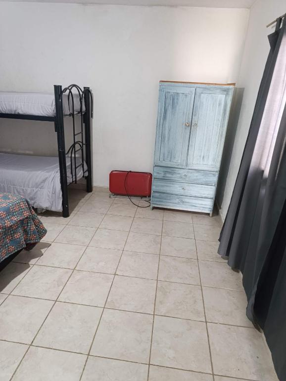 Postel nebo postele na pokoji v ubytování El ROBLE 2