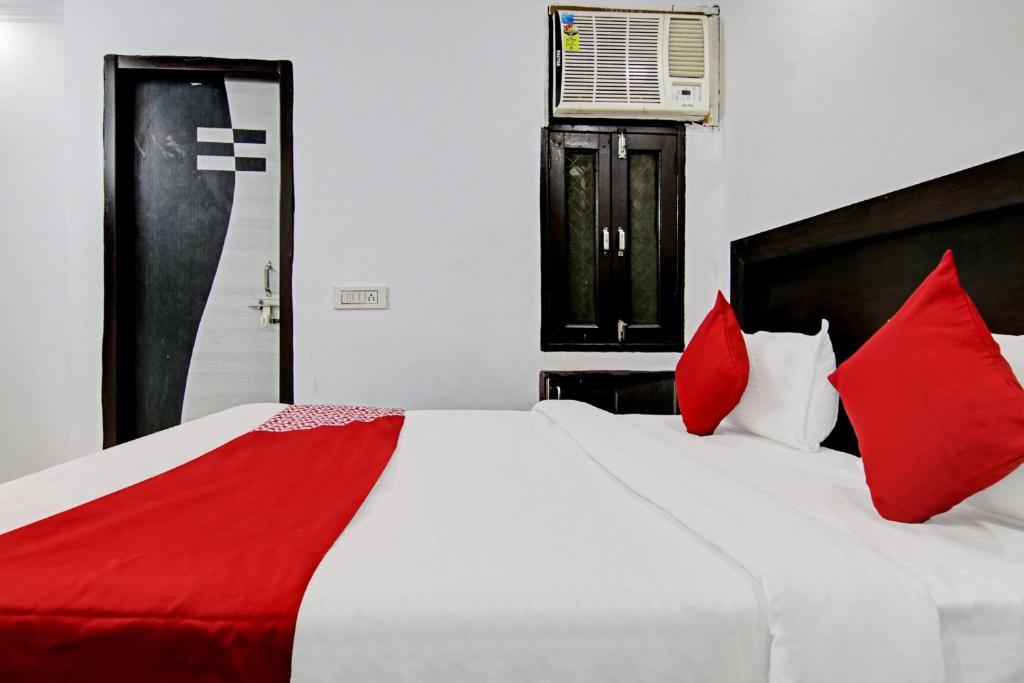 Postel nebo postele na pokoji v ubytování Hotel O Downtown
