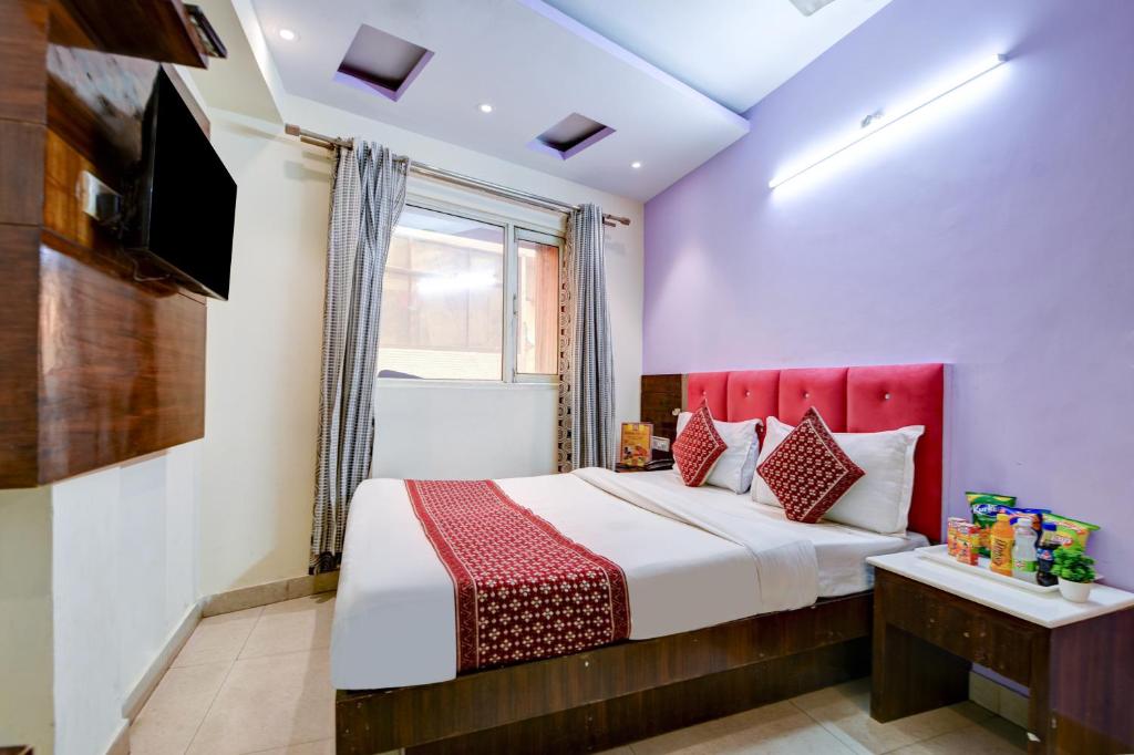 Postel nebo postele na pokoji v ubytování Hotel Snow White Inn - Paharganj New Delhi