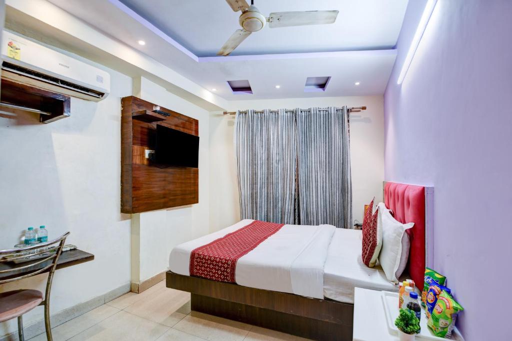 Postel nebo postele na pokoji v ubytování Hotel Snow White Inn - Paharganj New Delhi
