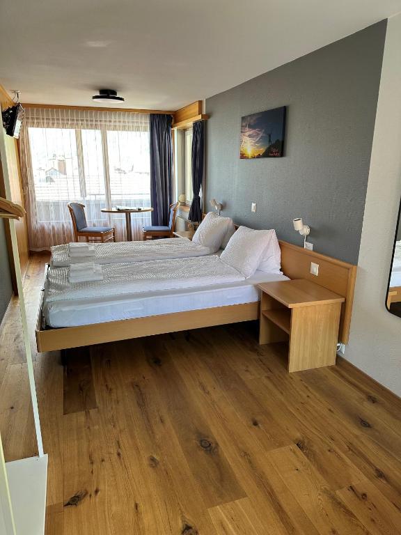 Postel nebo postele na pokoji v ubytování Hotel WALZ
