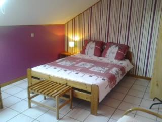 Postel nebo postele na pokoji v ubytování Hotel Dry Les Courtis