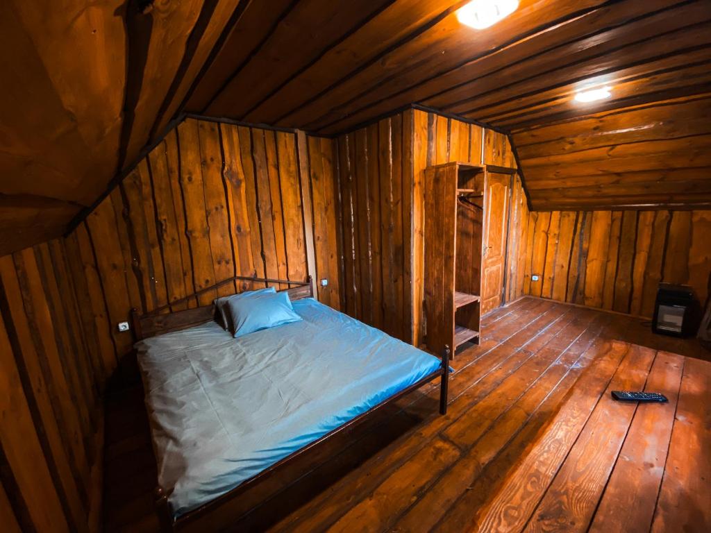 Postel nebo postele na pokoji v ubytování Еко-готель Quiet Forest