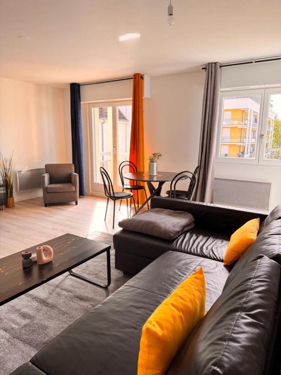 Khu vực ghế ngồi tại Appartement le Fonki st louis centre