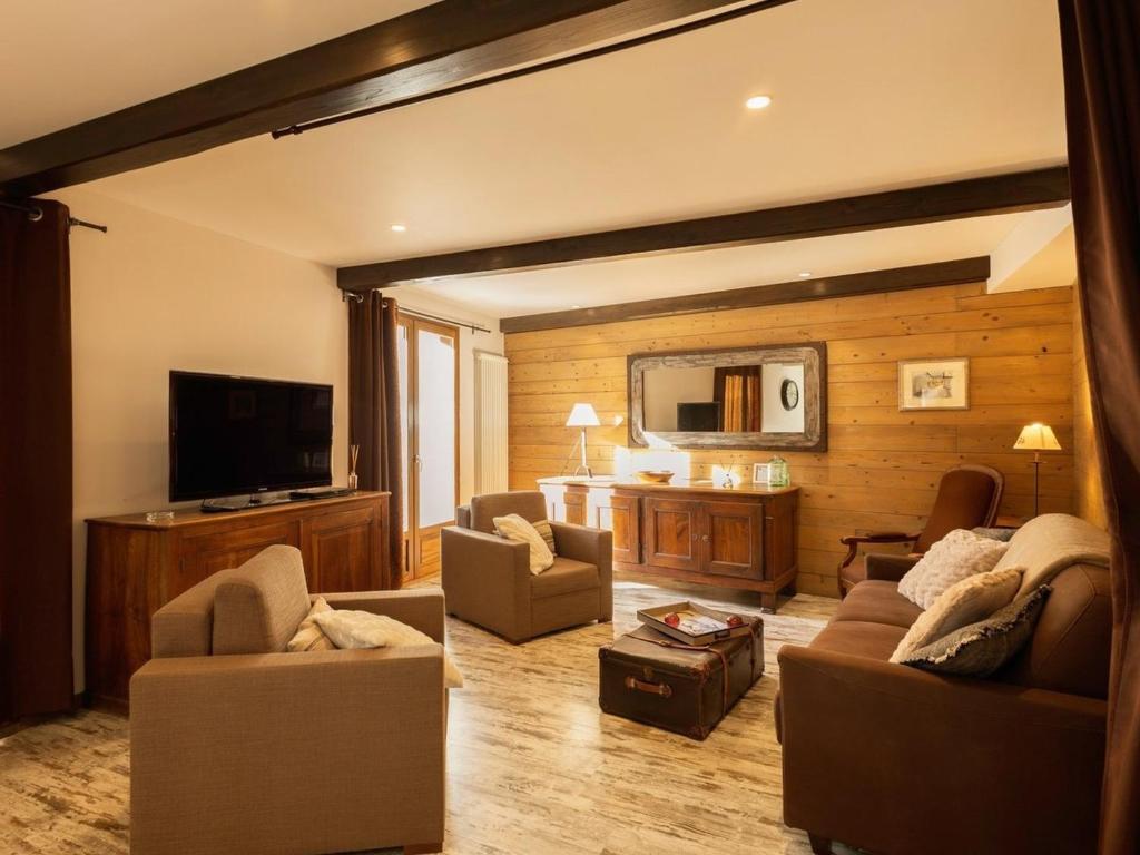 Μια τηλεόραση ή/και κέντρο ψυχαγωγίας στο Appartement 4 pièces - 9 pers - Terrasse - Centre de Valloire - Proche remontées mécaniques et loisirs - FR-1-263-215