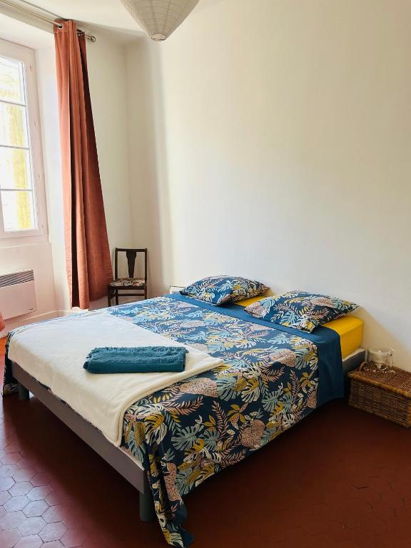 Postel nebo postele na pokoji v ubytování Chez Marion