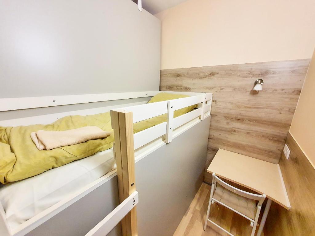 Postel nebo postele na pokoji v ubytování Tokyo Vibes - Private Sleeping Pods Hostel, Self check-in