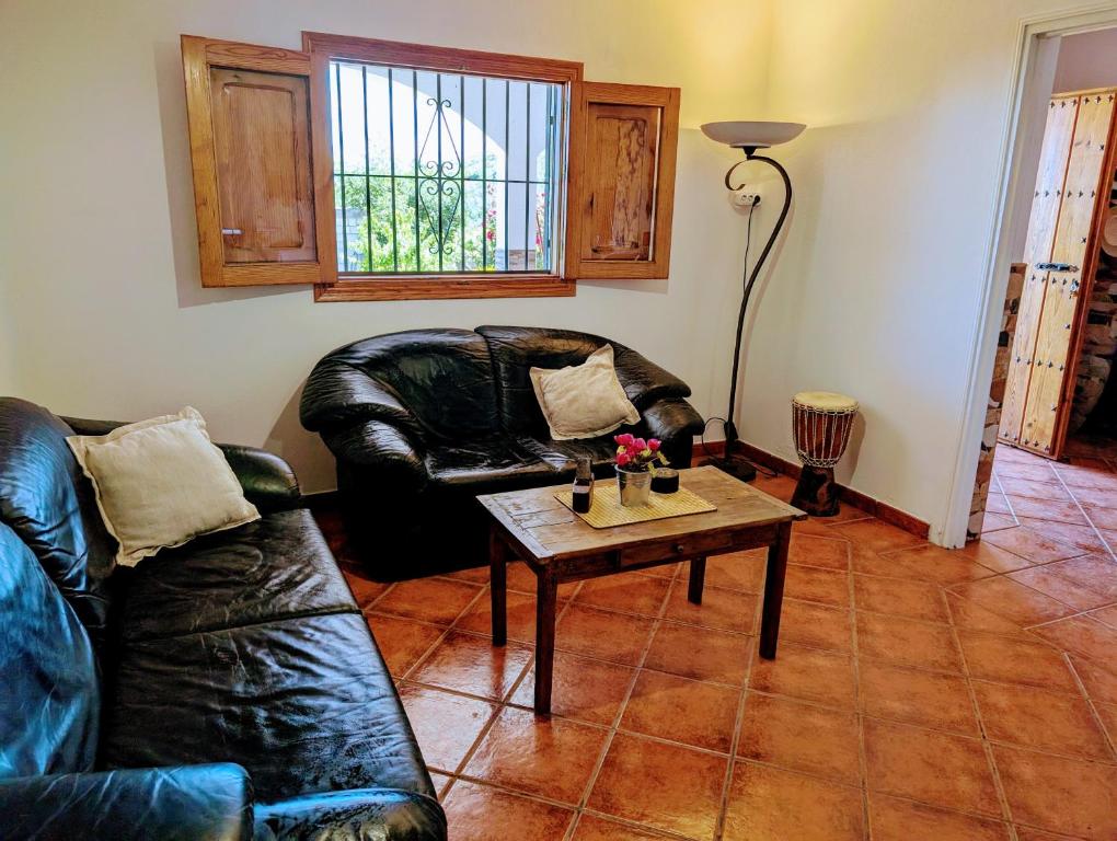 Zona de estar de Casa Rural en Ohanes, 1 dormitorio - El Cortijo Escondido, La Rosa