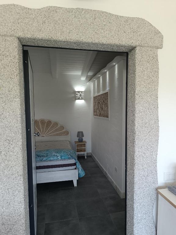 A bed or beds in a room at Bello Bello Rooms