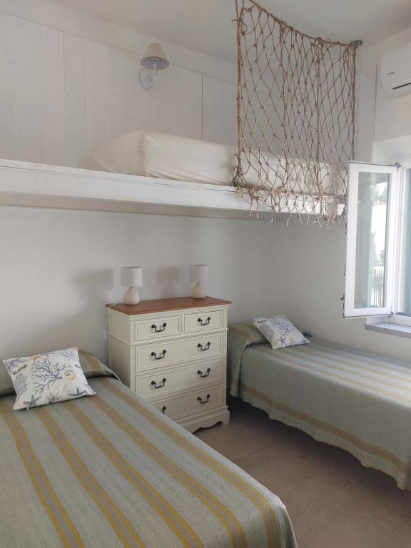 Postel nebo postele na pokoji v ubytování Casa Guerrino