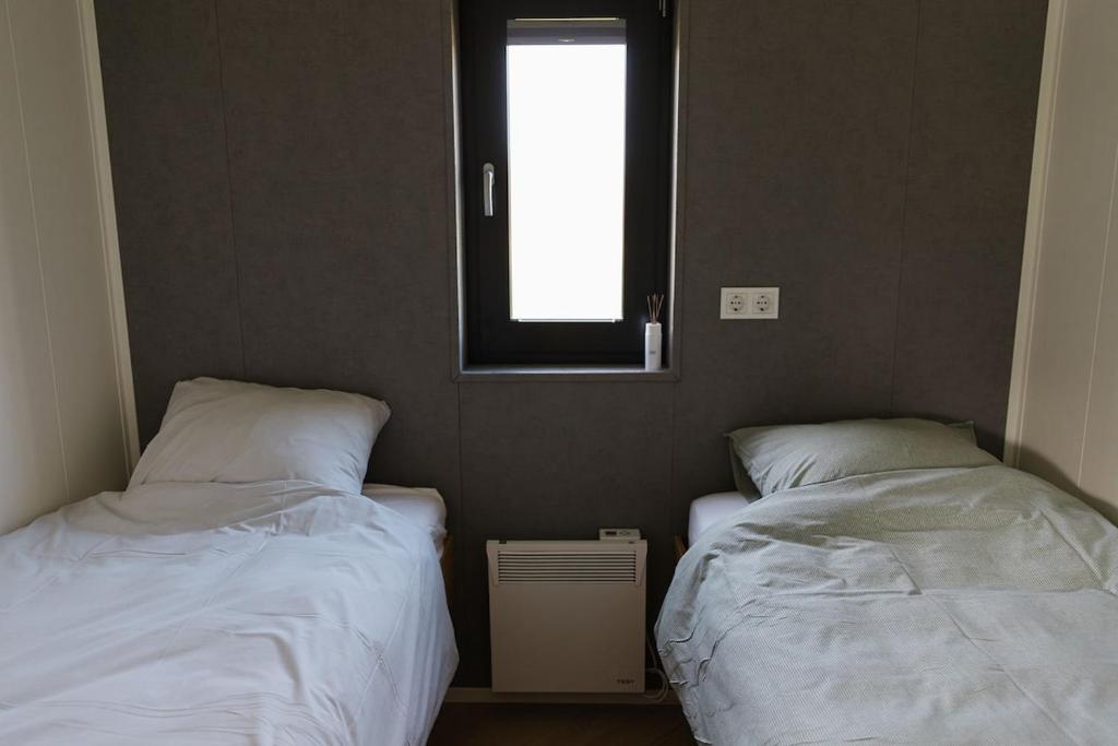 DriewegenにあるDe Eend - Tiny house in de Zeeuwse Natuurのギャラリーの写真