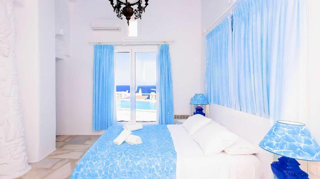 Postel nebo postele na pokoji v ubytování Villa Boufla