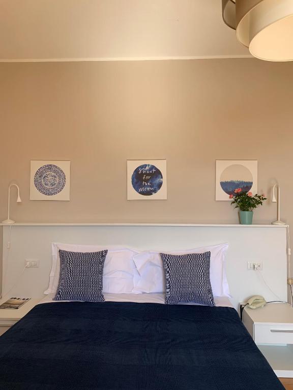 Postel nebo postele na pokoji v ubytování Hotel Loveno