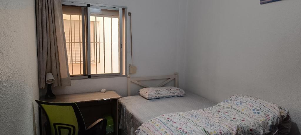 Łóżko lub łóżka w pokoju w obiekcie Kaz Bedrooms