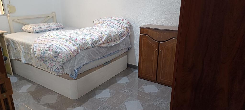 Łóżko lub łóżka w pokoju w obiekcie Kaz Bedrooms