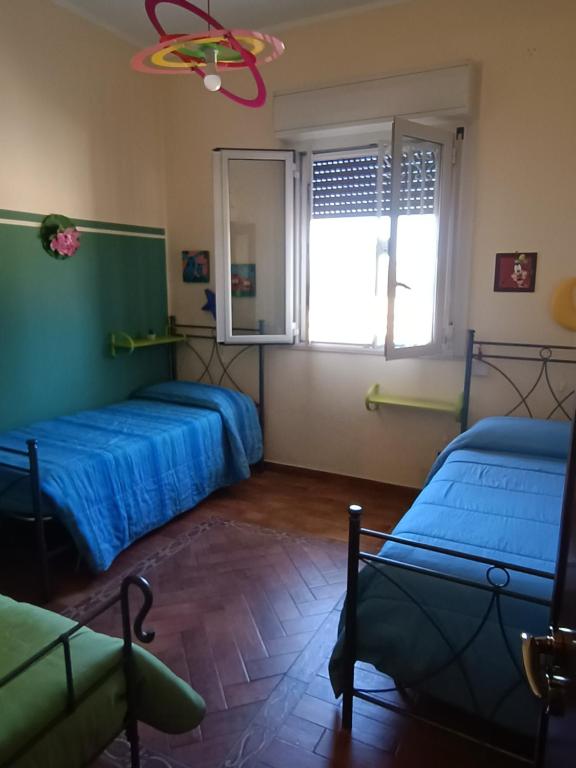 Posteľ alebo postele v izbe v ubytovaní Casa Igiea