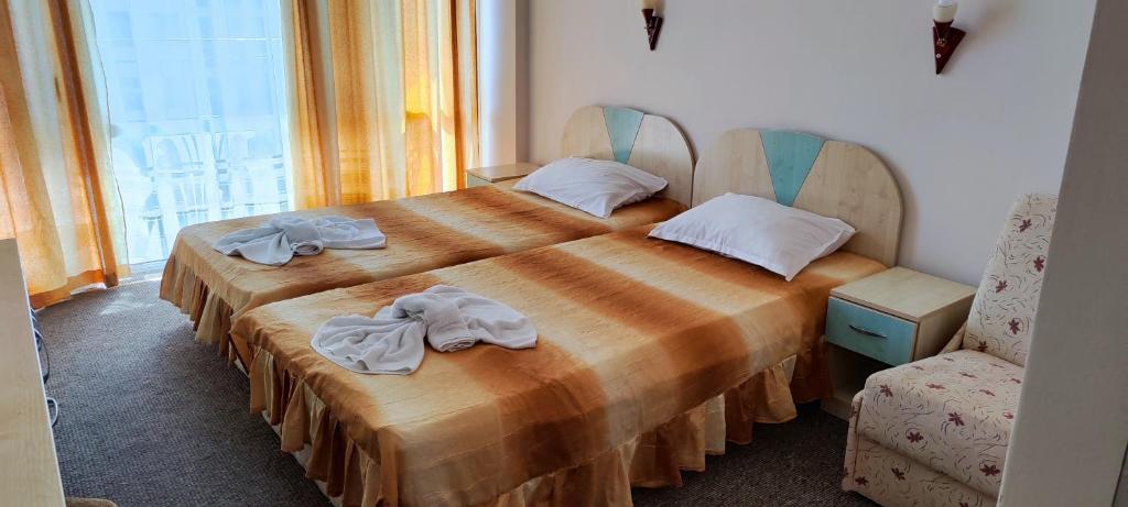Postel nebo postele na pokoji v ubytování Hotel Arda