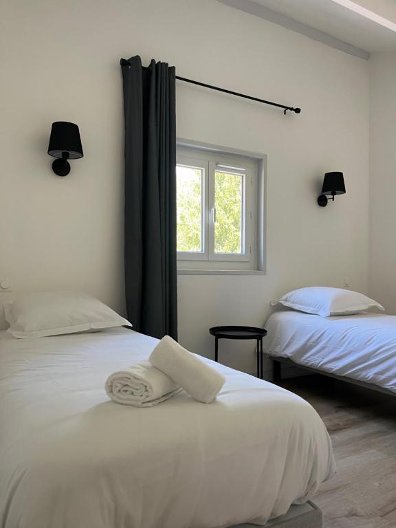 Postel nebo postele na pokoji v ubytování Le Moulin de Barette - Proche Le Puy-en-Velay