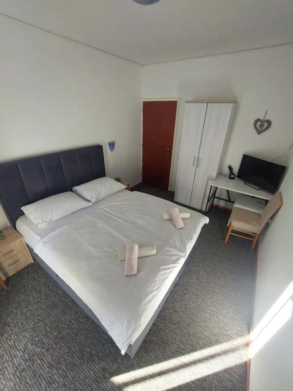 Postel nebo postele na pokoji v ubytování Villa Vilma