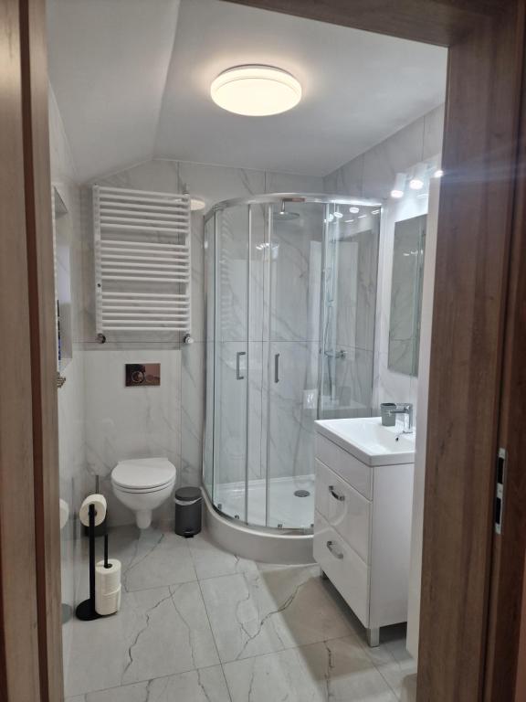 Kúpeľňa v ubytovaní Apartamenty Mazury