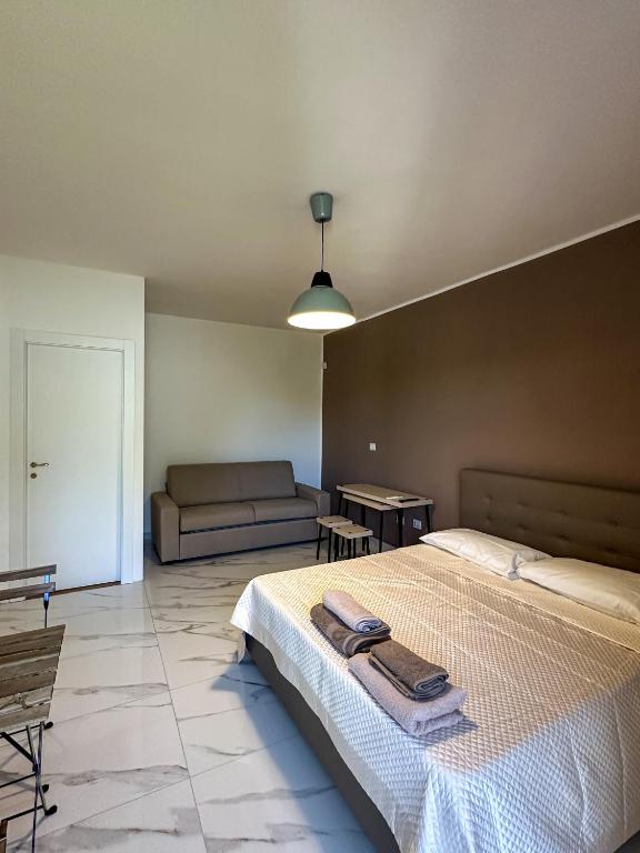 Postel nebo postele na pokoji v ubytování B&B Dimora di Campagna "alle falde del Vesuvio"
