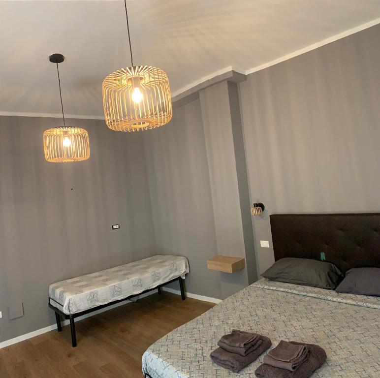 Postel nebo postele na pokoji v ubytování Riva Reno 4 Rooms