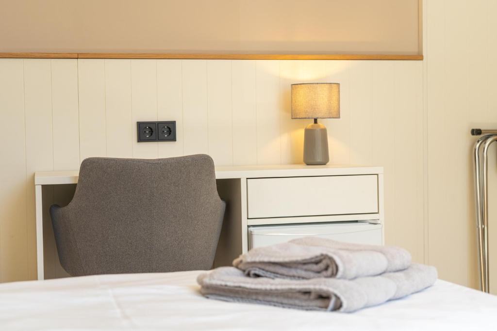 Postel nebo postele na pokoji v ubytování Hotel Seebrise Grömitz