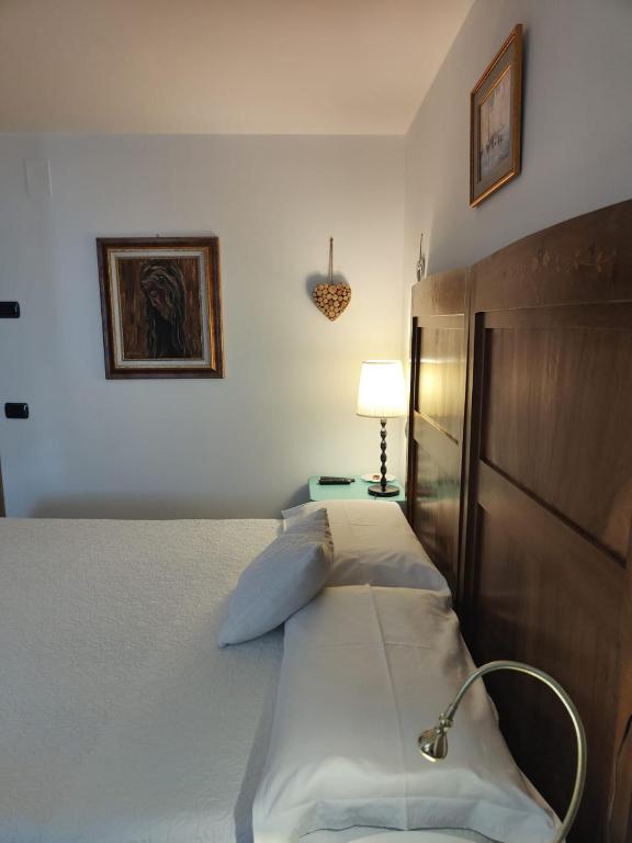 Posteľ alebo postele v izbe v ubytovaní B&B Ai Castagni