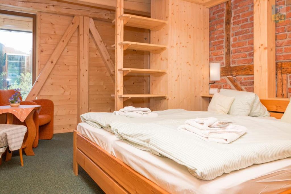 Postel nebo postele na pokoji v ubytování Josefova Bouda -Resort Svaty Frantisek