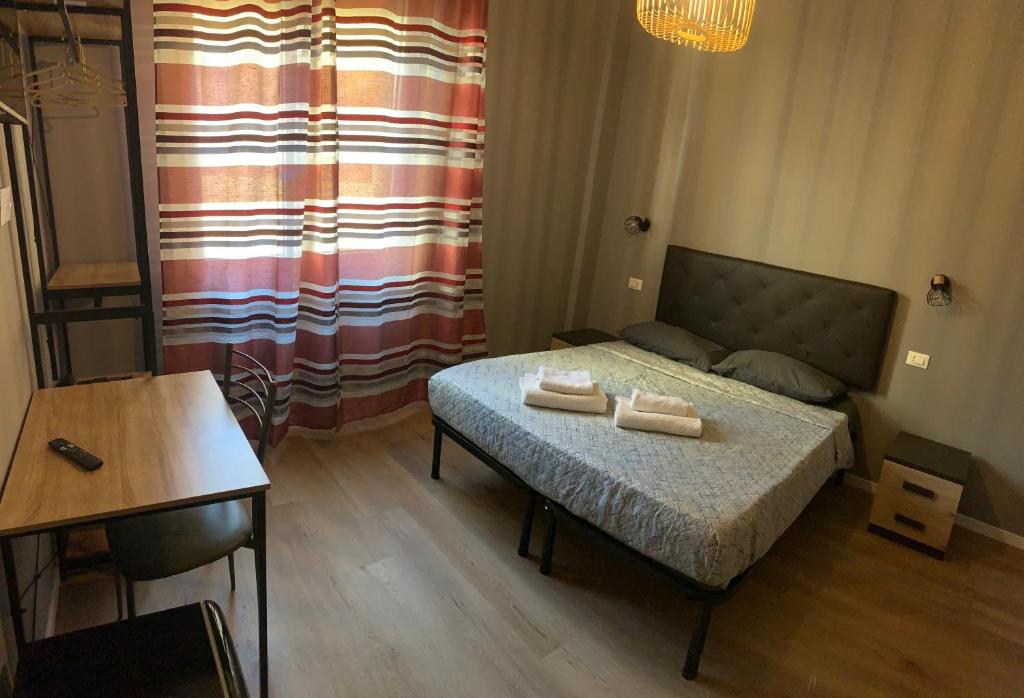 Postel nebo postele na pokoji v ubytování Riva Reno 4 Rooms