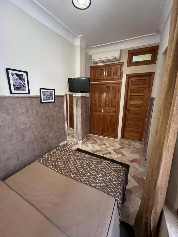 Postel nebo postele na pokoji v ubytování Riad Radia