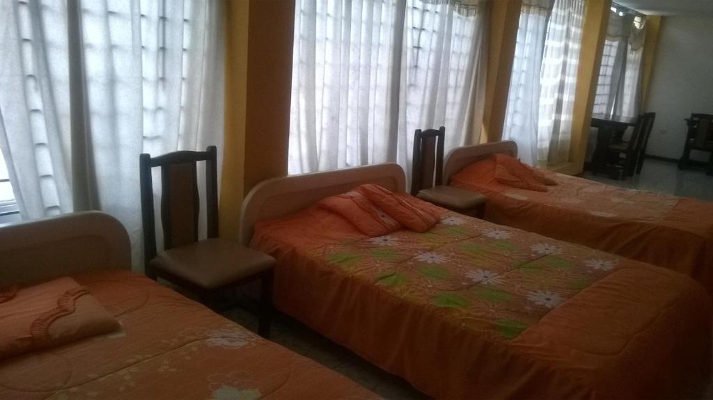 Postel nebo postele na pokoji v ubytování Hotel Bacastell