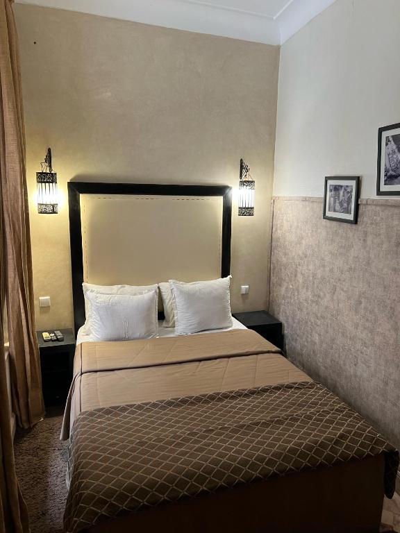 Postel nebo postele na pokoji v ubytování Riad Radia