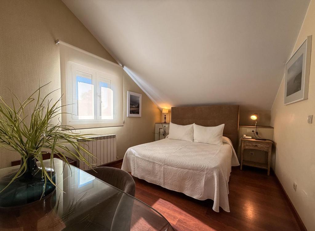 Postel nebo postele na pokoji v ubytování Hotel Verdemar