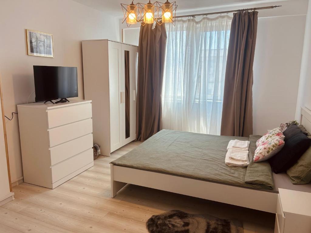 Postel nebo postele na pokoji v ubytování Casa NEVERSEEN