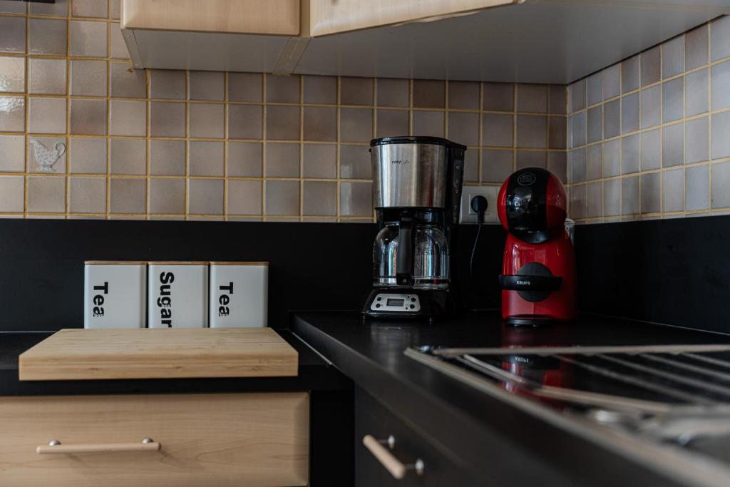 Kuchyňa alebo kuchynka v ubytovaní « L’atelier » halte charmante et reposante