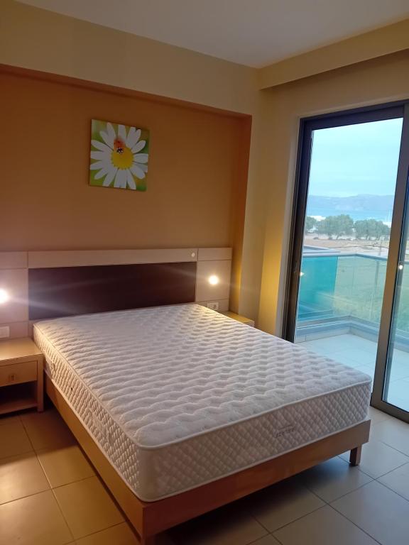 Posteľ alebo postele v izbe v ubytovaní Crystal Bay Hotel