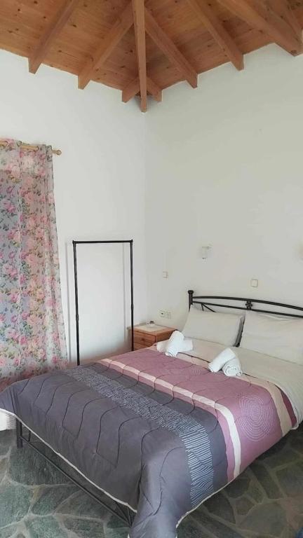 Postel nebo postele na pokoji v ubytování Anna Daniil Oasi Studios Skala Kallonis Lesvos