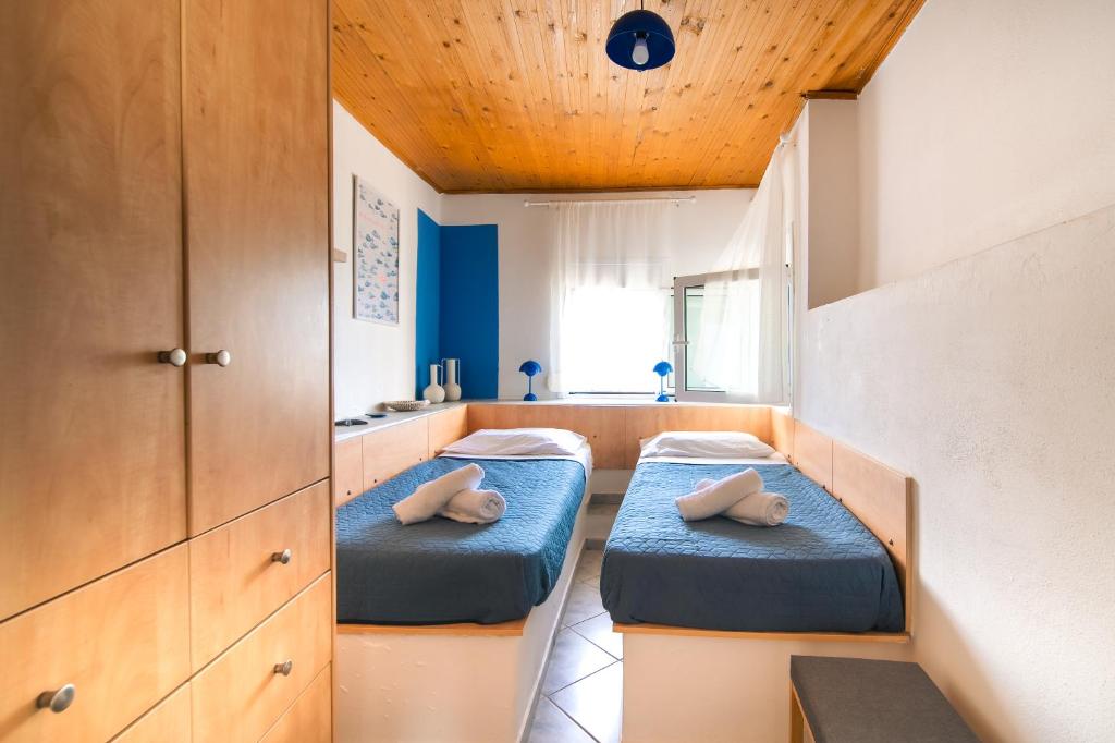 Postel nebo postele na pokoji v ubytování Cassa Ventossa Mochlos