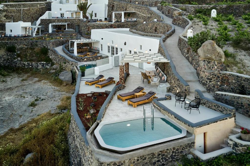 Bazén v ubytování El Verano Suites nebo v jeho okolí