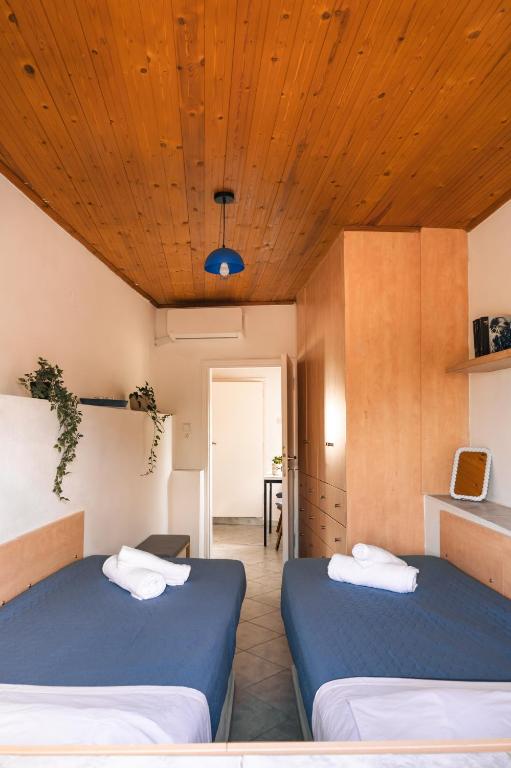 Postel nebo postele na pokoji v ubytování Cassa Ventossa Mochlos