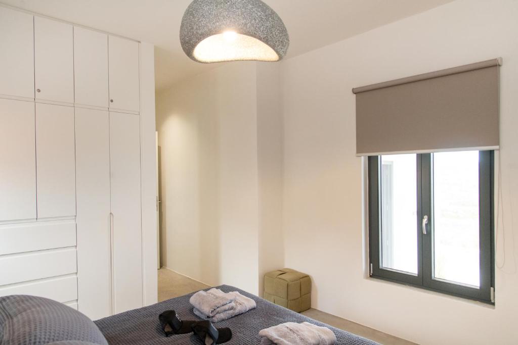 Voodi või voodid majutusasutuse Rockaine Suites toas