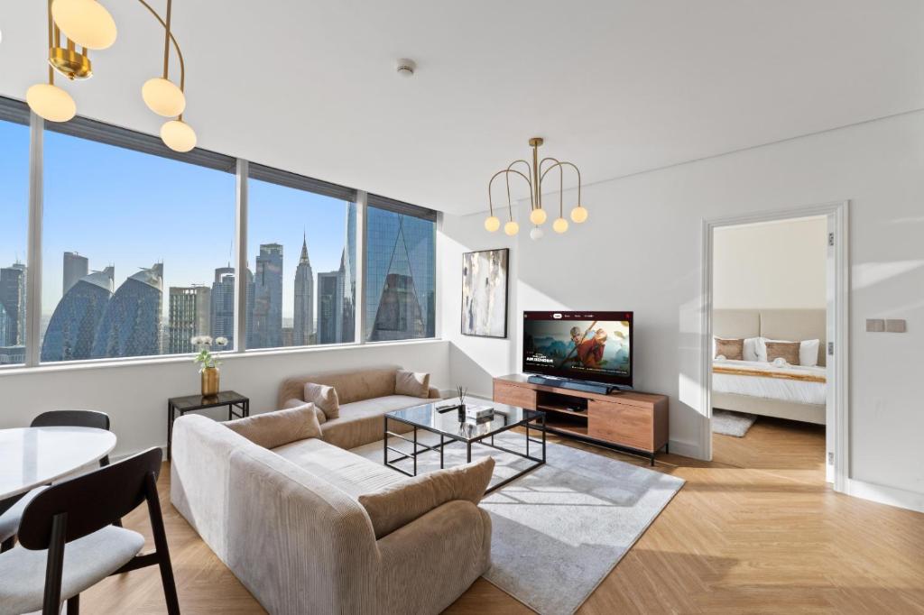 تلفاز و/أو أجهزة ترفيهية في Luxury Apt DIFC, XL Layout, Pool, Gym, Skyline View
