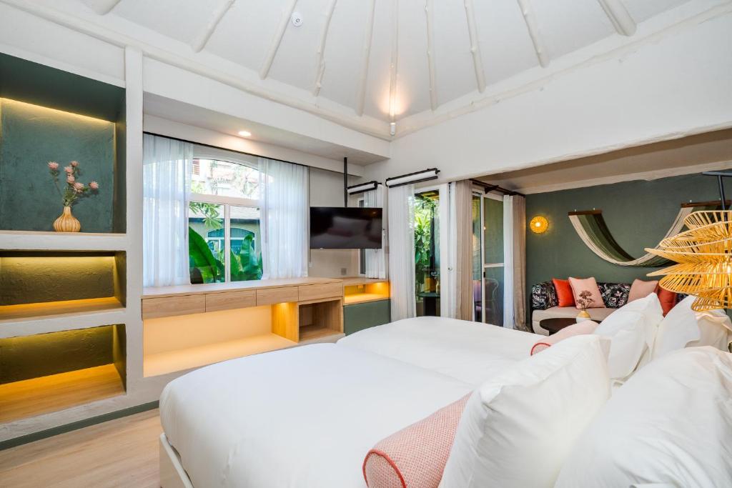 Postel nebo postele na pokoji v ubytování Davinia Hua Hin Resort