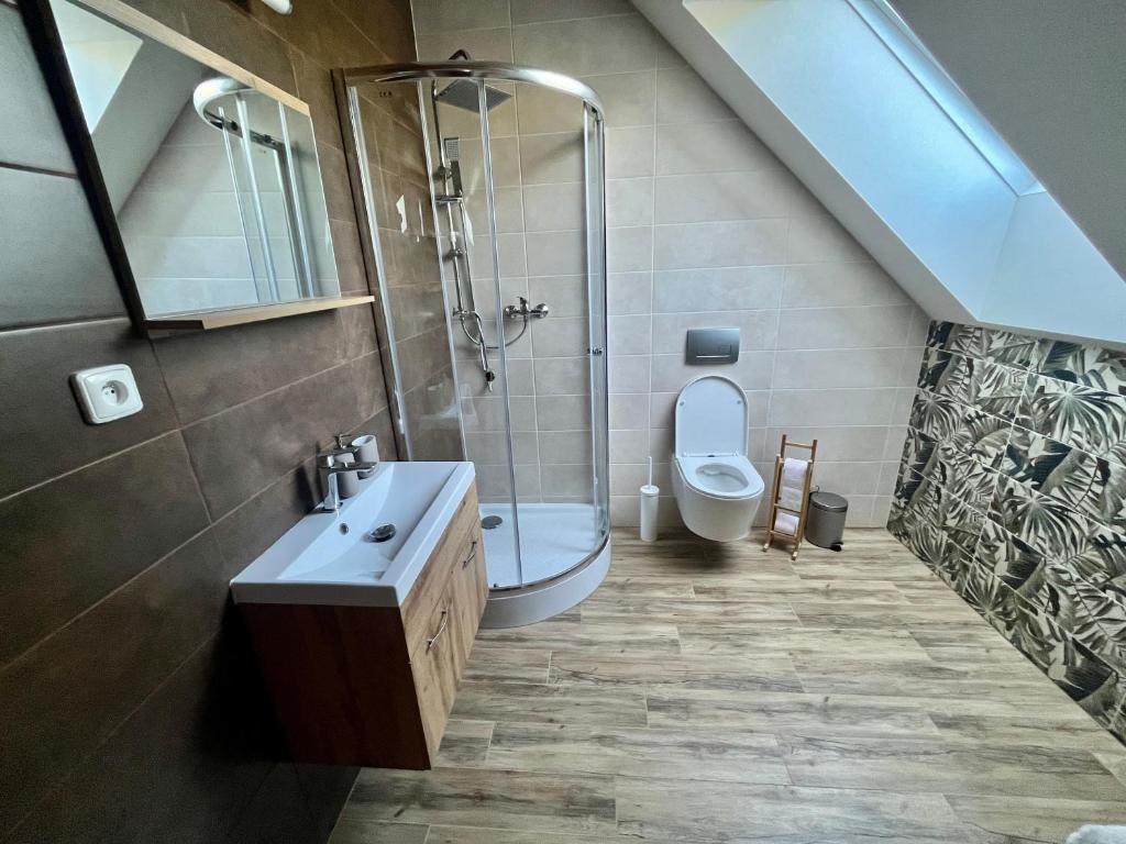 Koupelna v ubytování Apartmány Statek Bezdědice